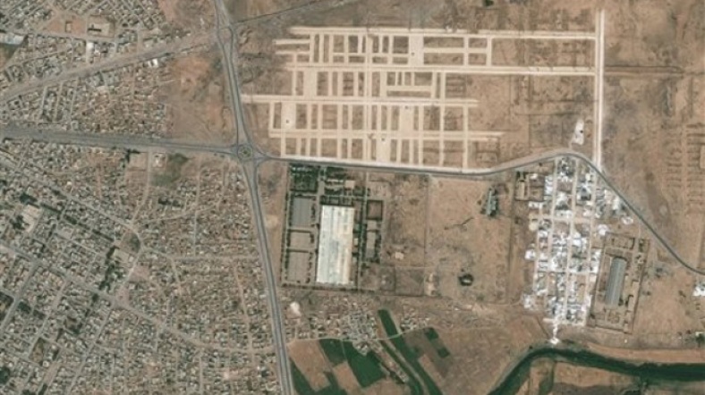 El Hasakah şehrindeki tesis, 14 Ağustos 2011 tarihinde çekilmiş bir uydu fotoğrafında görülüyor.